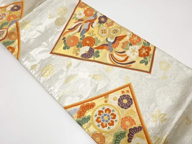 色紙に尾長鳥・花模様織出し袋帯